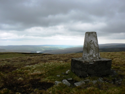 The trig point on Burnhope Seat looking to Burnhope Reservoir