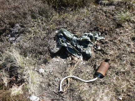 What seemed to be a small bomb attached to a parachute